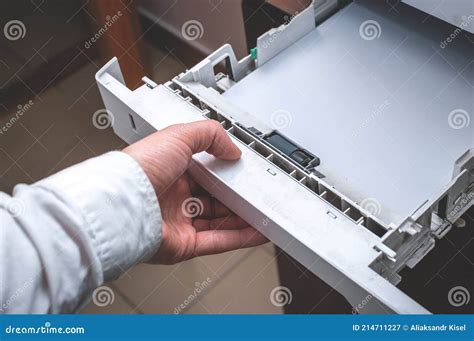 Working With An Office Printer Male Hand Closes The Printer S Paper